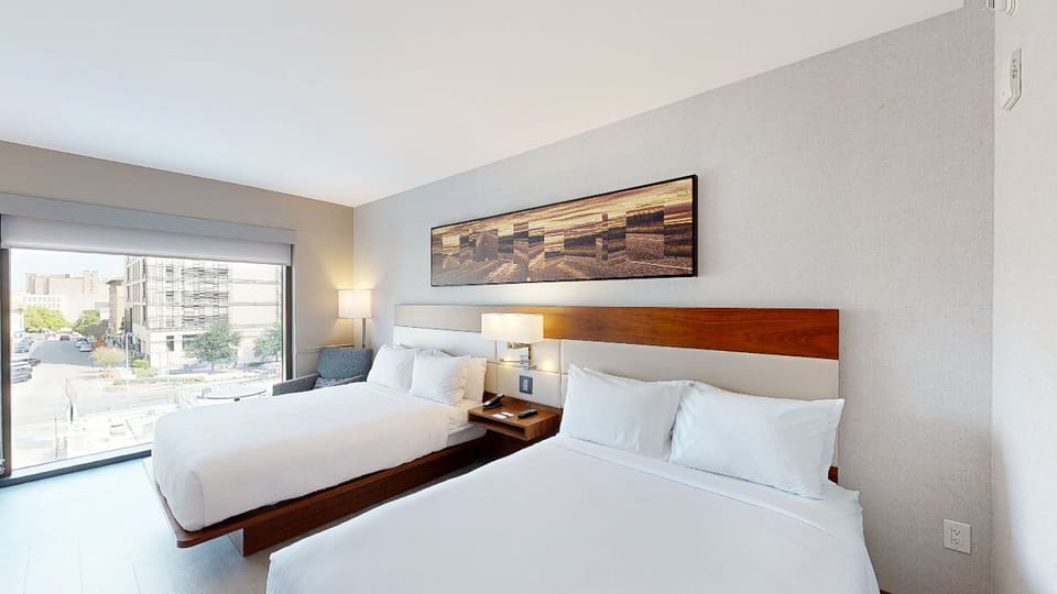 Double Queen Room at ACHOTELAUSTINUNIVERSITY — 3D virtual tour